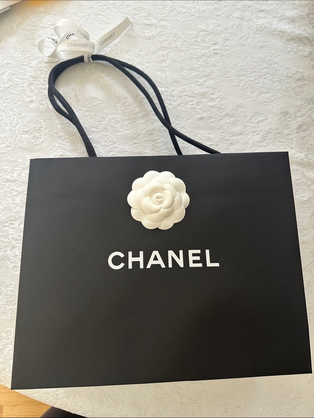 CHANEL Black shopping bag with White Camellia and White Logo